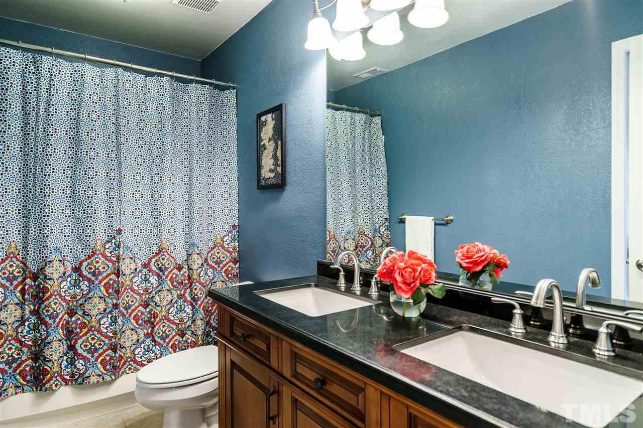 5532 Hamstead Crossing Raleigh, NC 27612 - Photo 15 of 25 a bathroom with a sink mirror and toilet