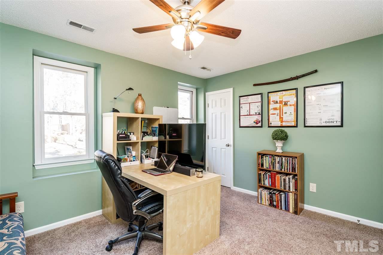 5532 Hamstead Crossing Raleigh, NC 27612 - Photo 17 of 25 a view of a workspace with furniture and a window