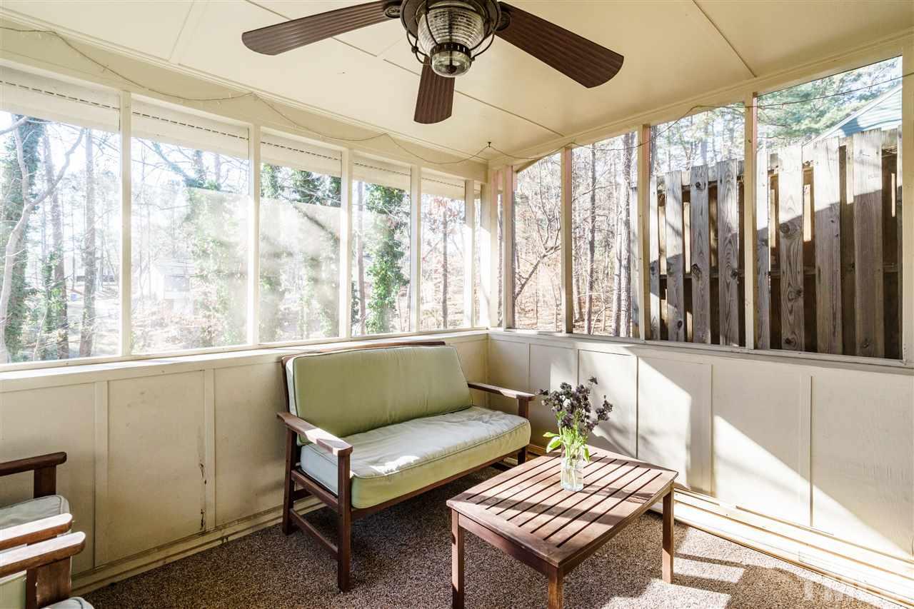 5532 Hamstead Crossing Raleigh, NC 27612 - Photo 24 of 25 a living room with furniture and a large window