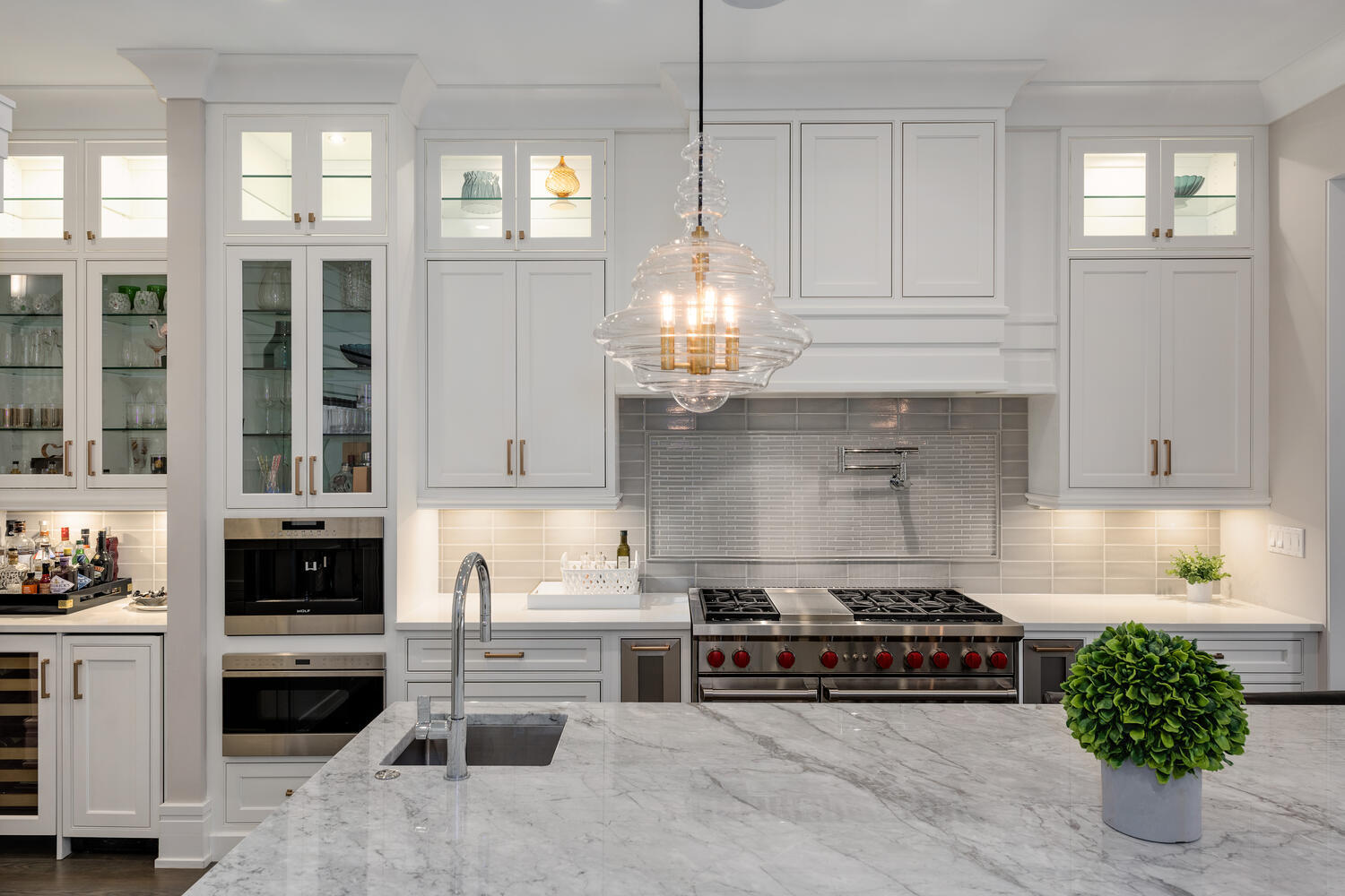 1823 North Bissell Street Chicago, IL 60614 - Photo 11 of 56 a kitchen with a stove and white cabinets