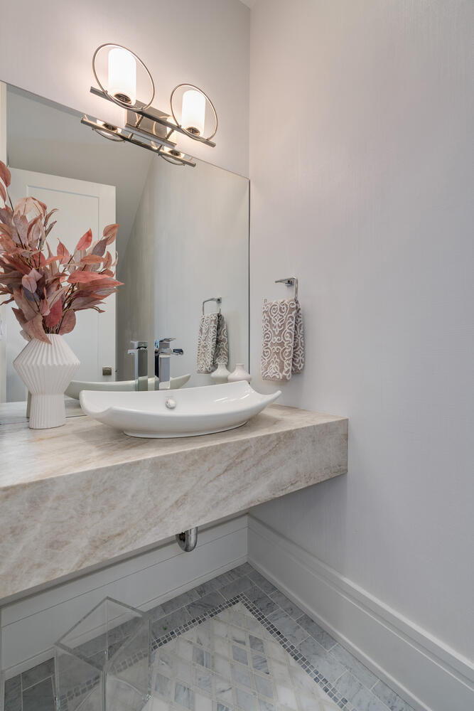 1823 North Bissell Street Chicago, IL 60614 - Photo 23 of 56 a bathroom with a sink and a mirror