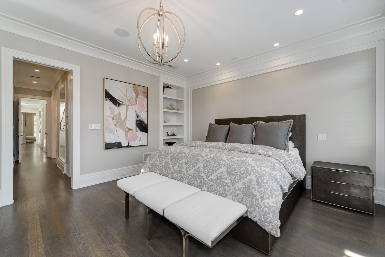 1823 North Bissell Street Chicago, IL 60614 - Photo 26 of 56 a bedroom with a large bed and a chandelier