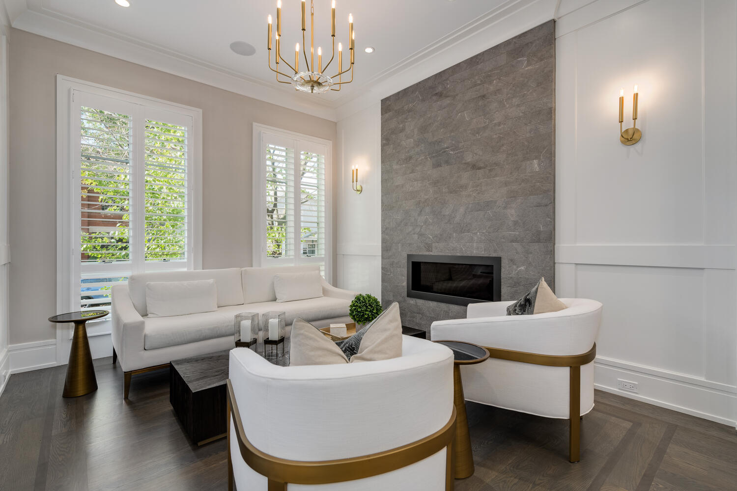 1823 North Bissell Street Chicago, IL 60614 - Photo 3 of 56 a living room with furniture a chandelier and a fireplace