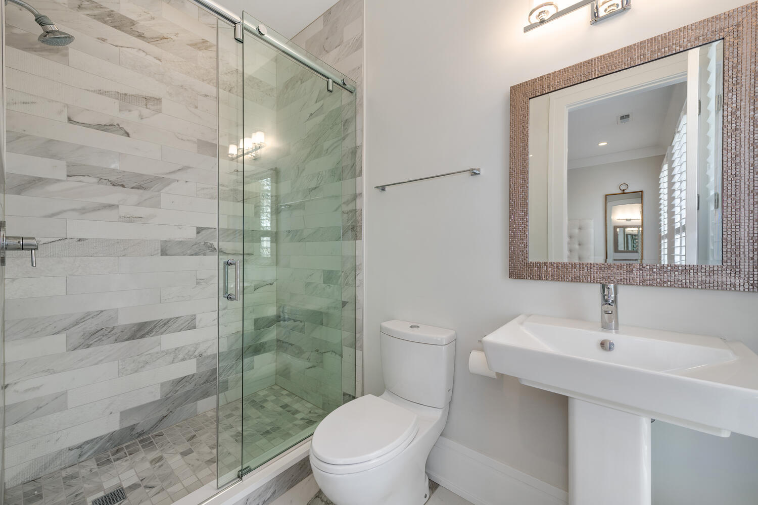 1823 North Bissell Street Chicago, IL 60614 - Photo 32 of 56 a bathroom with a shower a sink and toilet