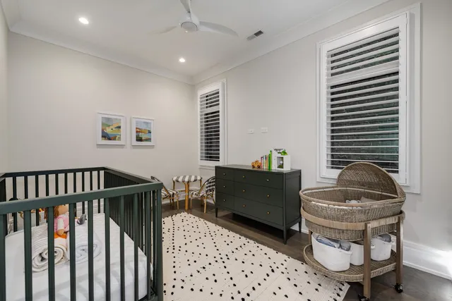 a bathroom with a sink toilet a mirror and shower