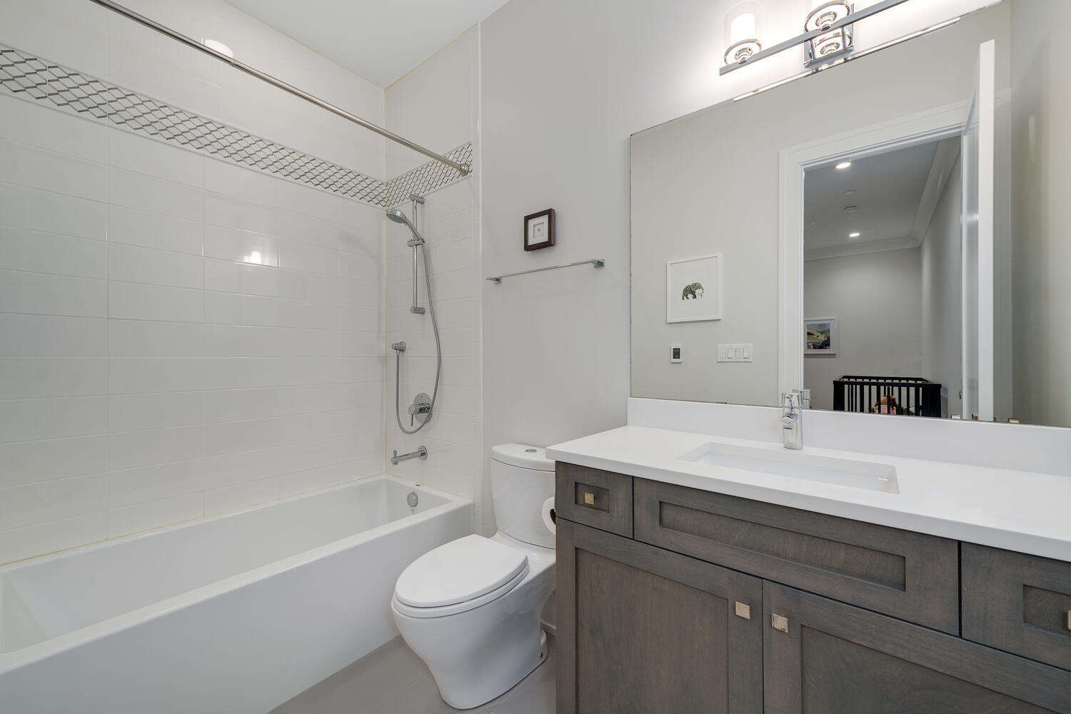 1823 North Bissell Street Chicago, IL 60614 - Photo 34 of 56 a bathroom with a sink a toilet and shower