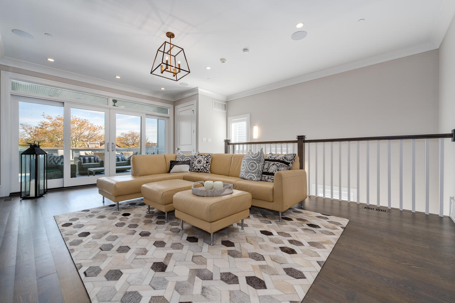 1823 North Bissell Street Chicago, IL 60614 - Photo 37 of 56 a living room with furniture a rug and a chandelier