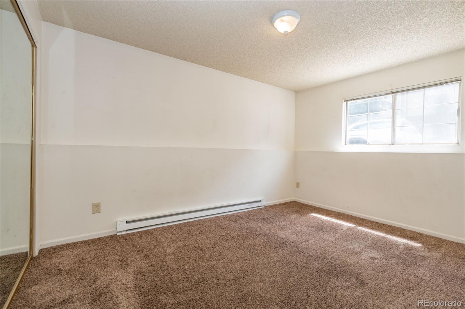 720 City Park Avenue, Unit C310 Fort Collins, CO 80521 - Photo 11 of 17 an empty room with a window