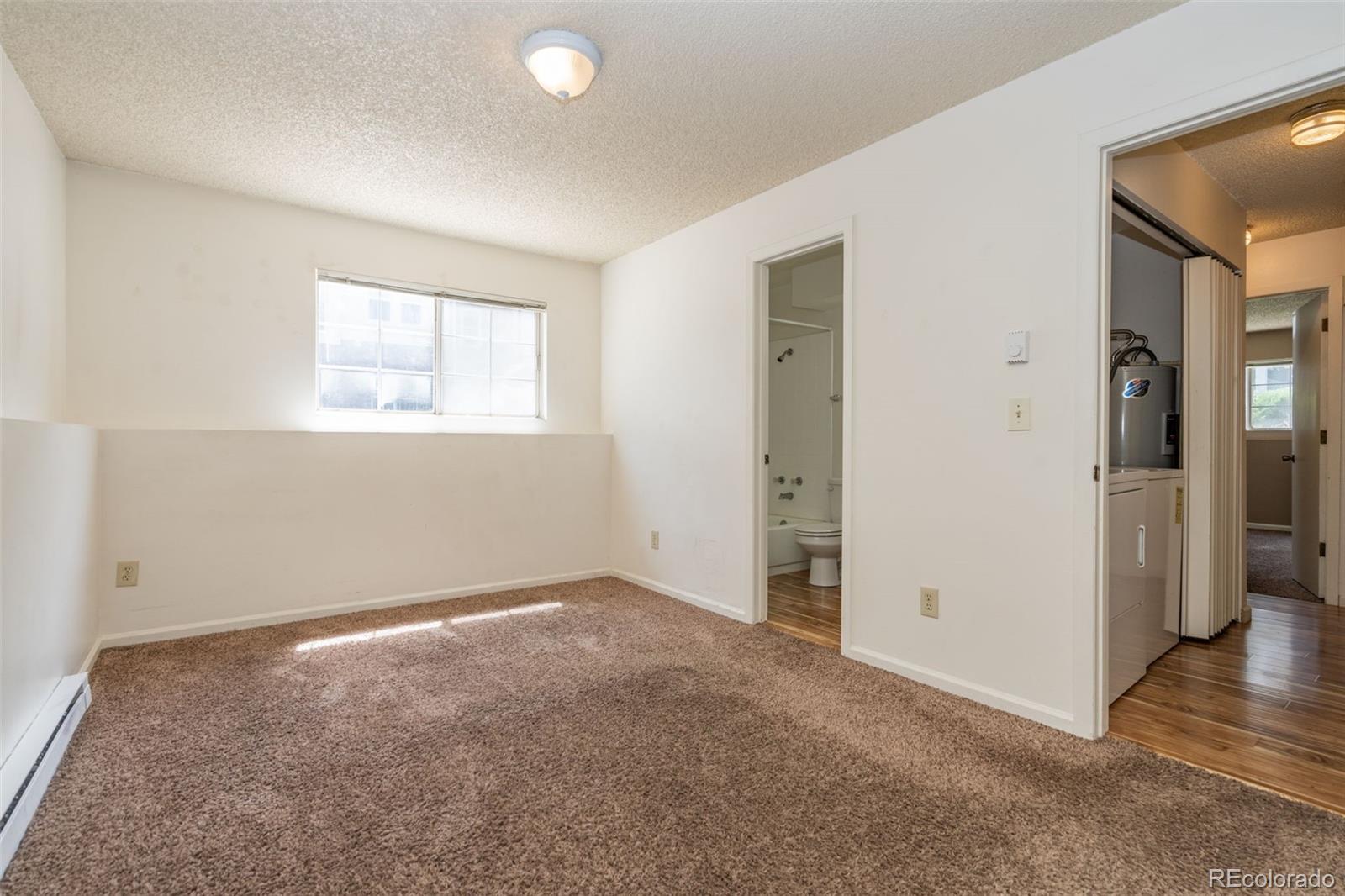 720 City Park Avenue, Unit C310 Fort Collins, CO 80521 - Photo 12 of 17 an empty room with windows