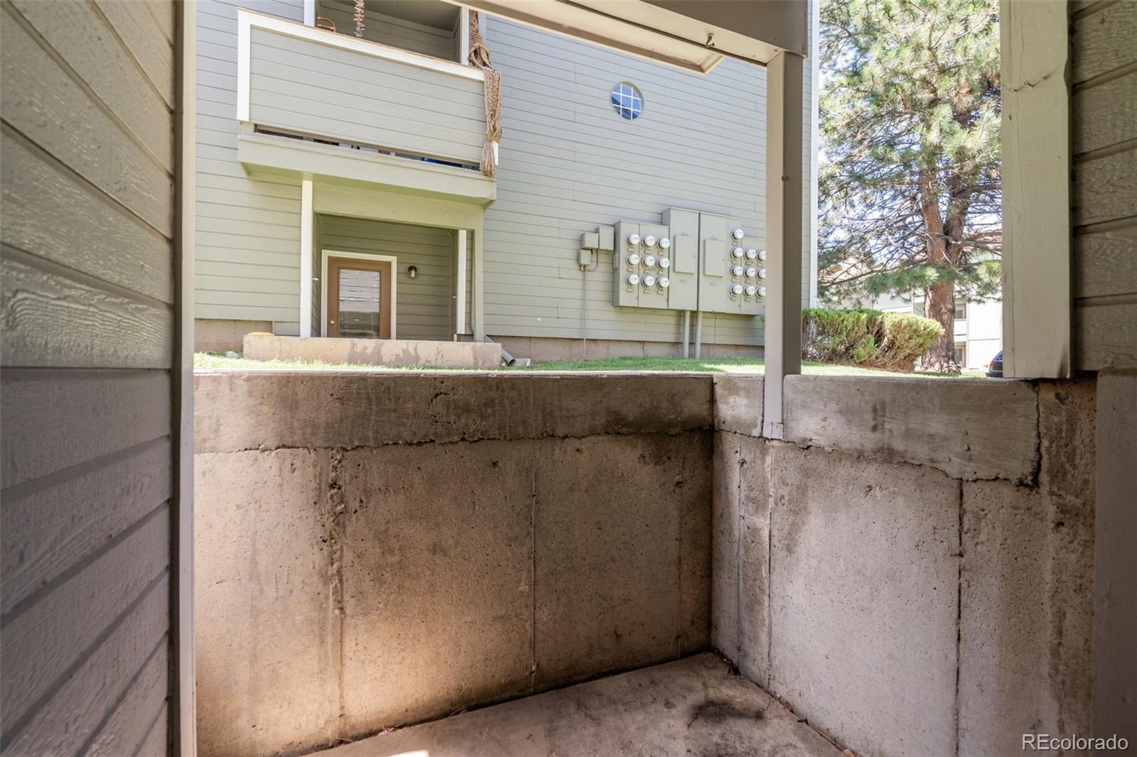 720 City Park Avenue, Unit C310 Fort Collins, CO 80521 - Photo 16 of 17 a view of a brick house with a large window