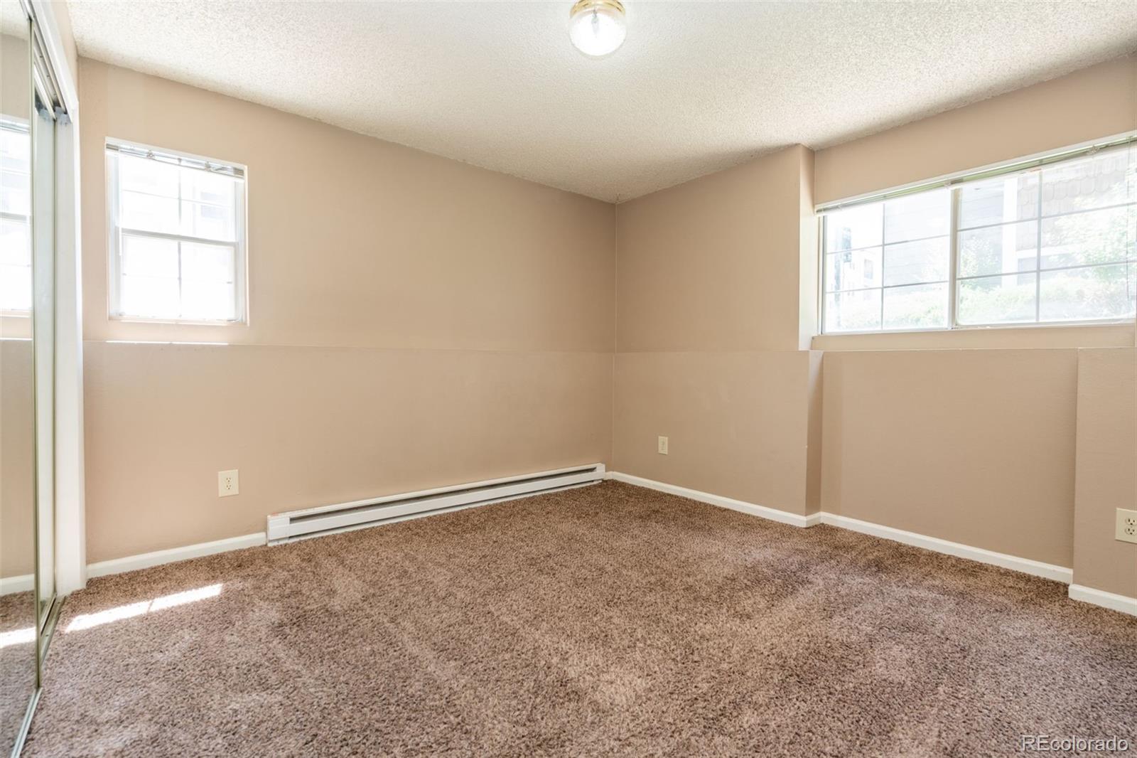 720 City Park Avenue, Unit C310 Fort Collins, CO 80521 - Photo 8 of 17 an empty room with a window