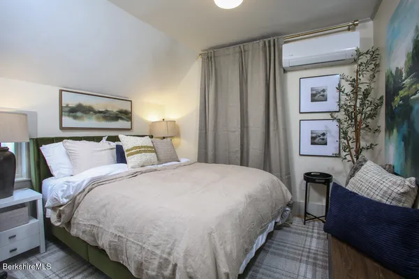 a kitchen with a dining table and chairs