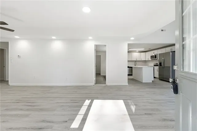 a view of a kitchen with a sink