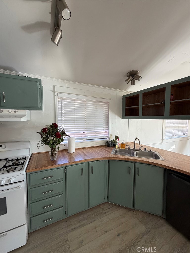 4047 Foothill Drive Lucerne, CA 95458 - Photo 67 of 75 a kitchen with a sink and cabinets