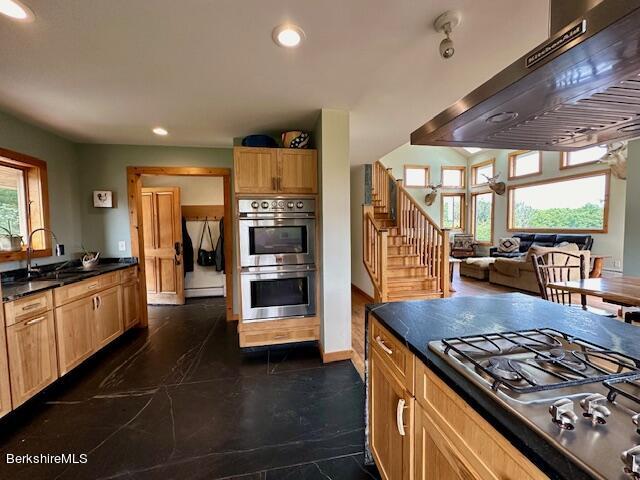 26 A Stonebridge Way Tyringham, MA 01238 - Photo 11 of 74 a kitchen with stainless steel appliances granite countertop a stove and a view of living room