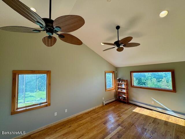 26 A Stonebridge Way Tyringham, MA 01238 - Photo 26 of 74 a view of a room with window ceiling fan and wooden floor