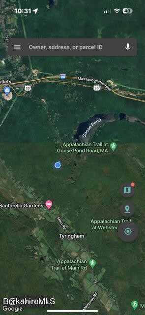 26 A Stonebridge Way Tyringham, MA 01238 - Photo 50 of 74 a view of a golf course with a lake