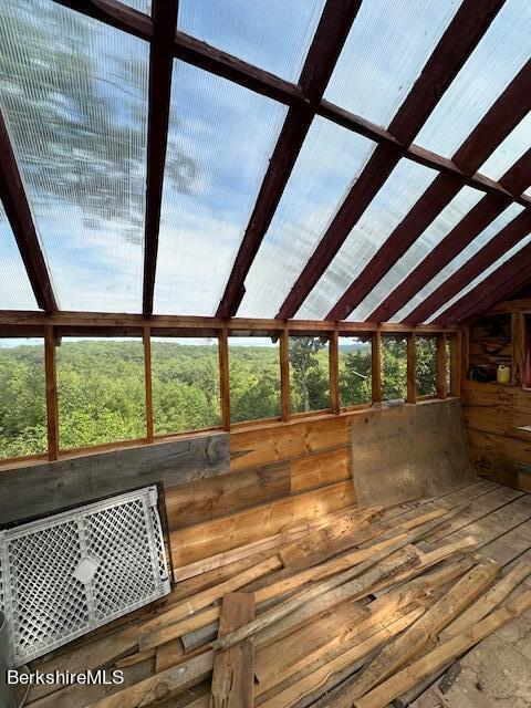 26 A Stonebridge Way Tyringham, MA 01238 - Photo 53 of 74 a view of room with window and wooden floor