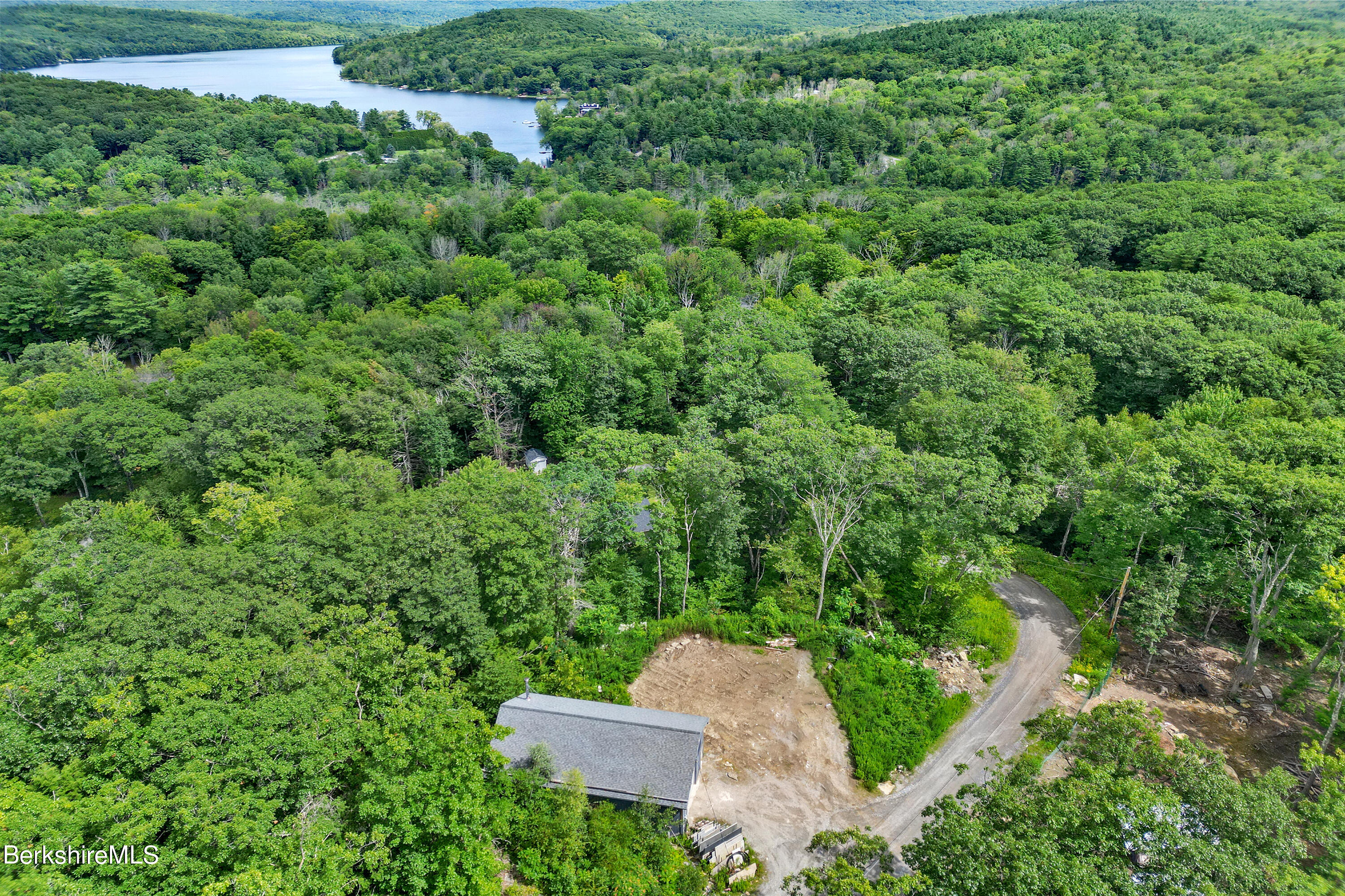 26 A Stonebridge Way Tyringham, MA 01238 - Photo 67 of 74 an aerial view of a house with yard