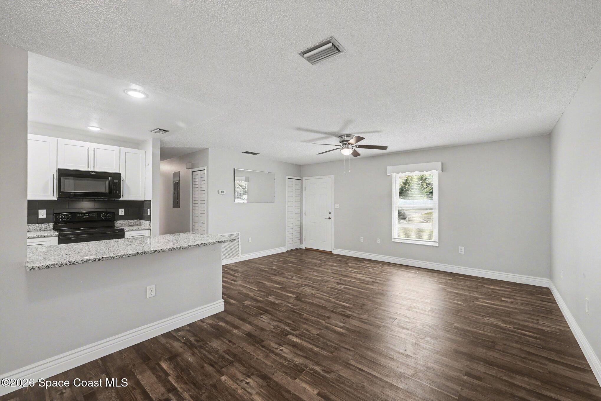 6860 Cecil Road Cocoa, FL 32927 - Photo 5 of 40 Living/Dining Combo
