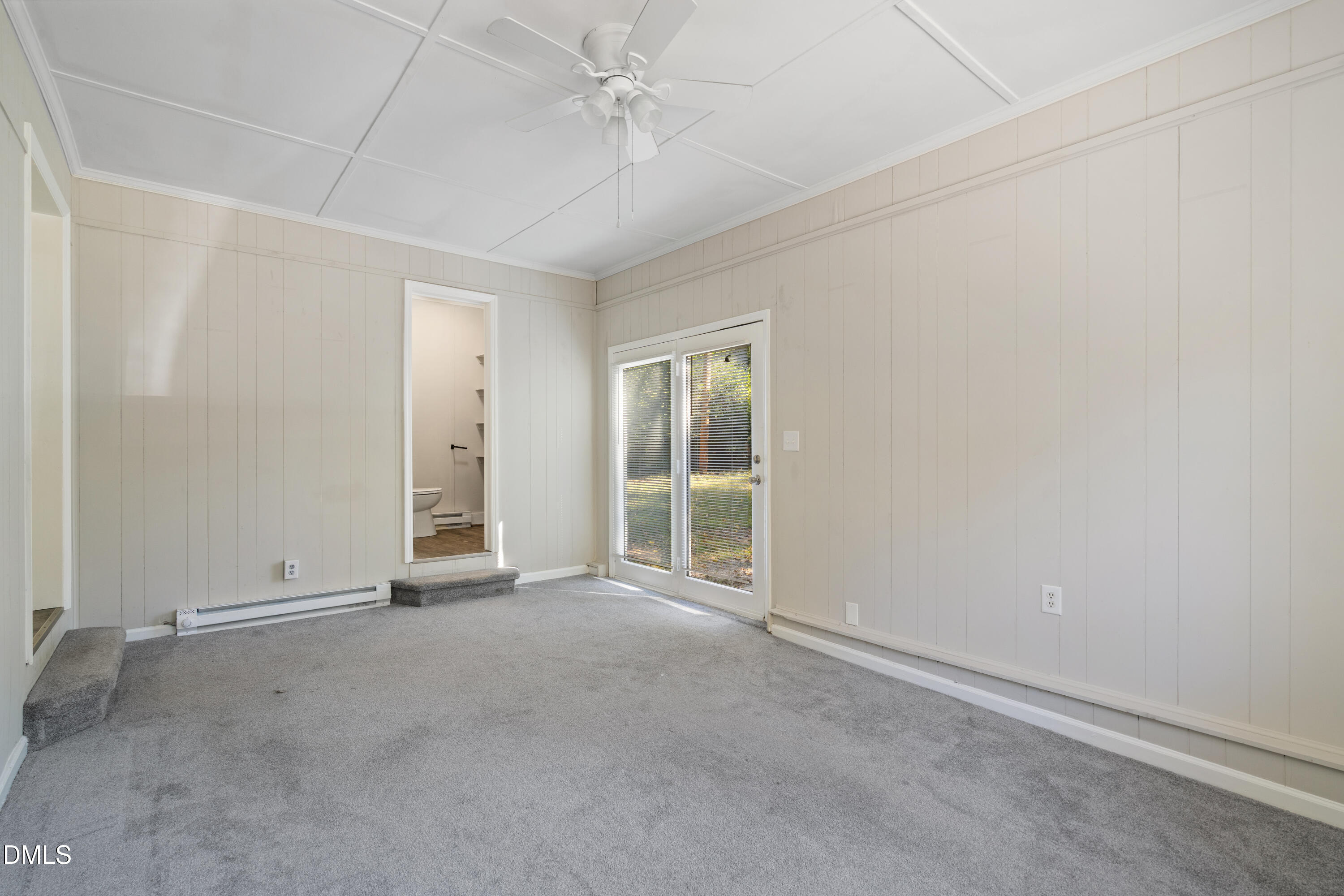 70 Lynnbank Estates Road Kittrell, NC 27544 - Photo 11 of 21 an empty room with fan and windows