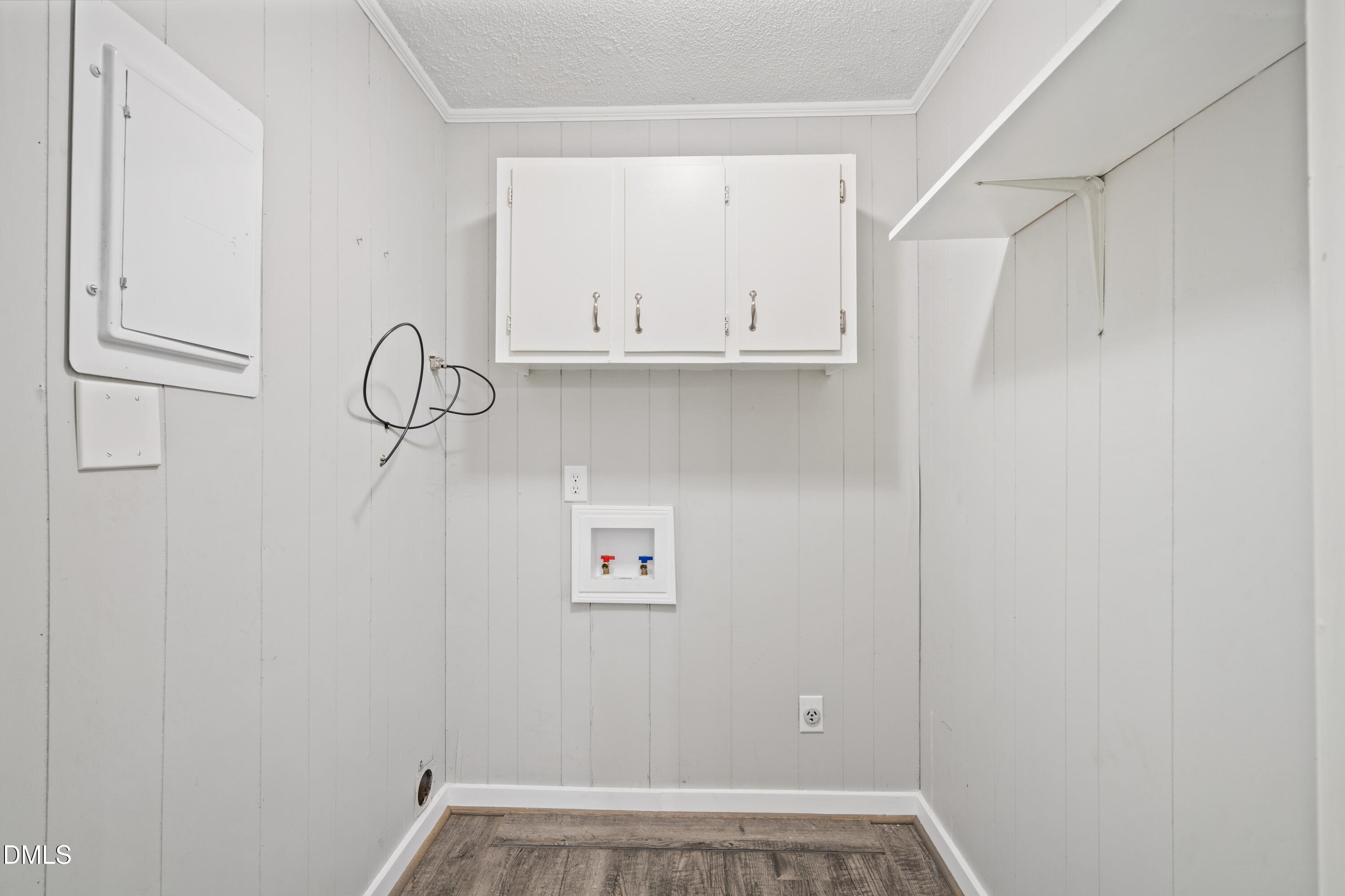 70 Lynnbank Estates Road Kittrell, NC 27544 - Photo 13 of 21 a view of a storage and utility room with racks on the wall