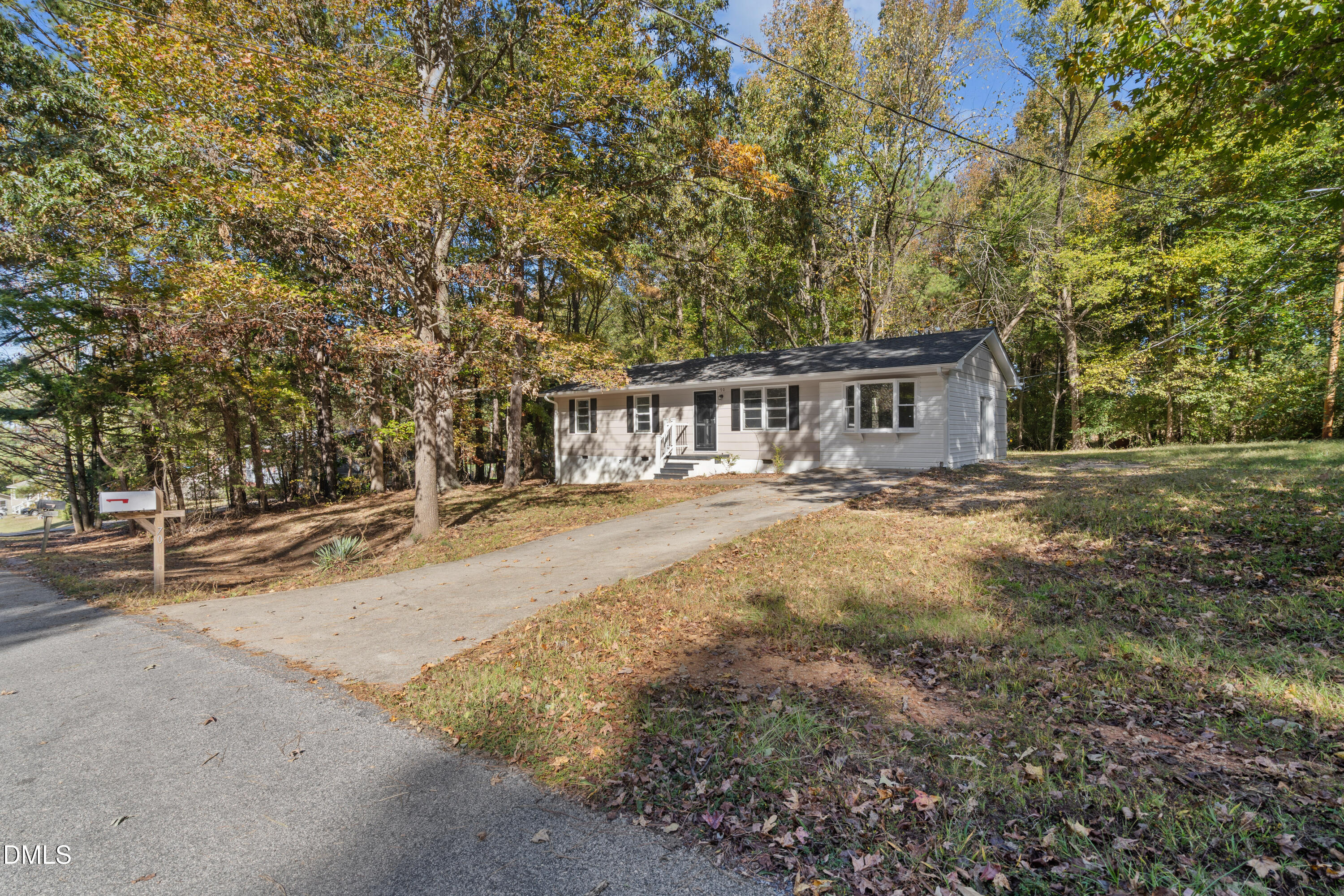 70 Lynnbank Estates Road Kittrell, NC 27544 - Photo 2 of 21 a view of residential houses with yard and trees