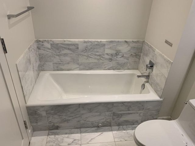 $1,300,000 | 580 Washington Street, Unit 206, Boston, MA 02111