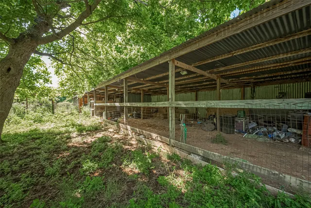 a view of a backyard of a house