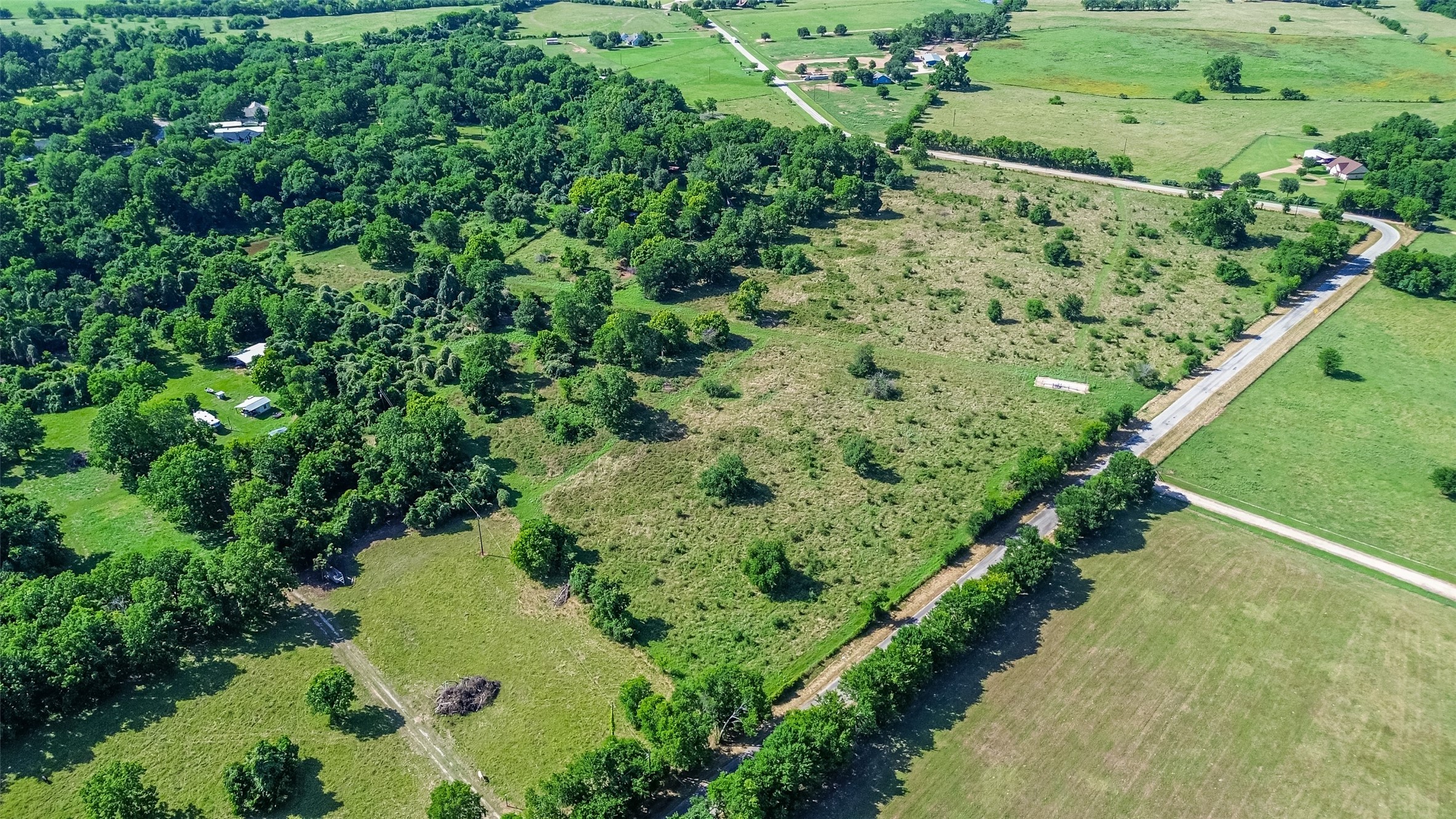 2511 Hartwell Road Brookshire, TX 77423 - Photo 35 of 40 a view of a garden with a lake