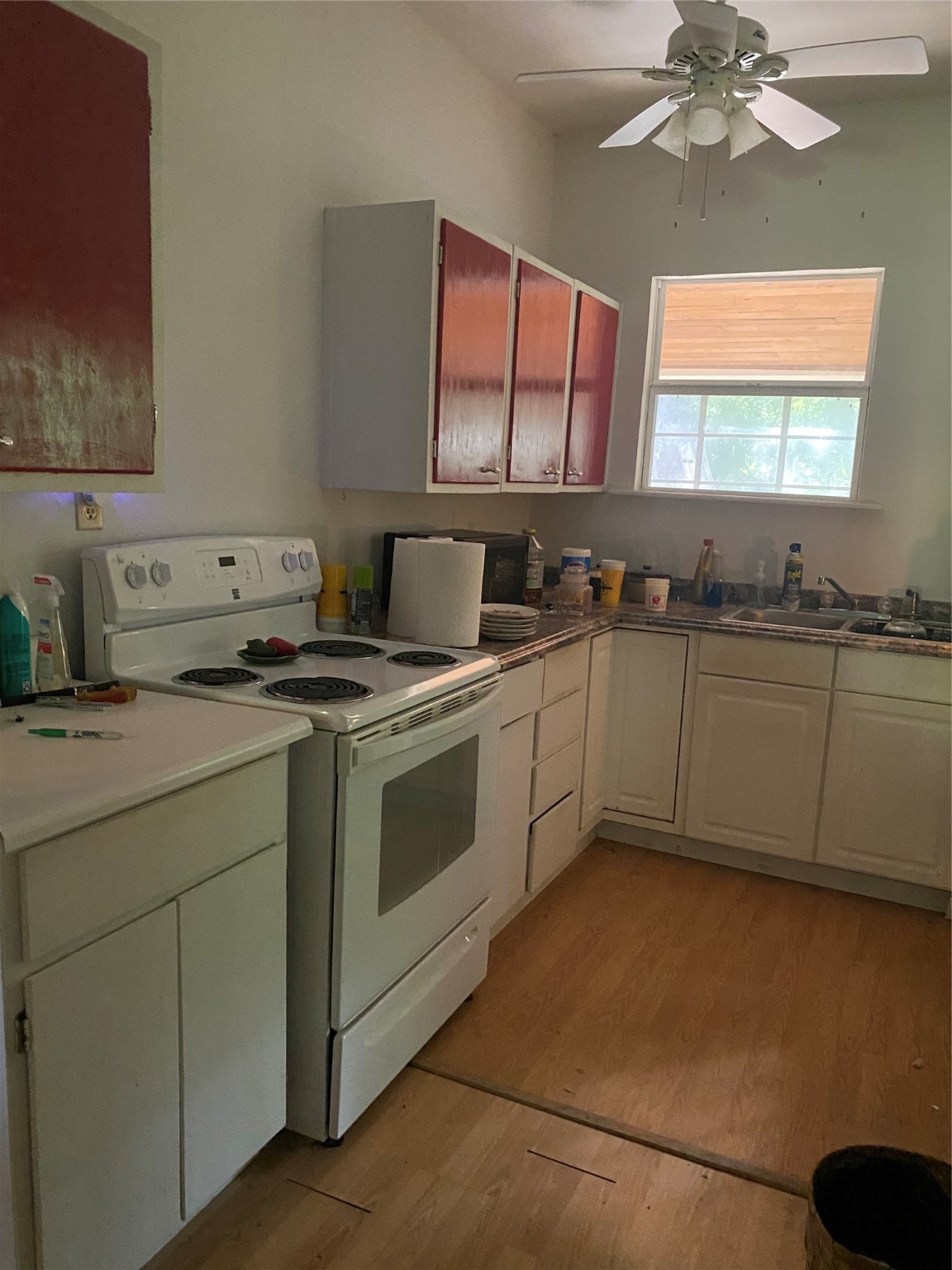 2511 Hartwell Road Brookshire, TX 77423 - Photo 9 of 40 a kitchen with stainless steel appliances a sink stove and cabinets