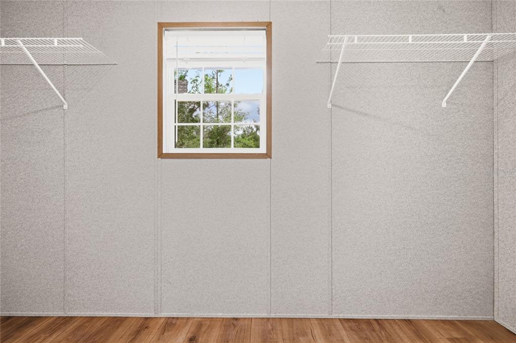 150 19th Street Interlachen, FL 32148 - Photo 20 of 30 a view of small space with wooden floor and a window