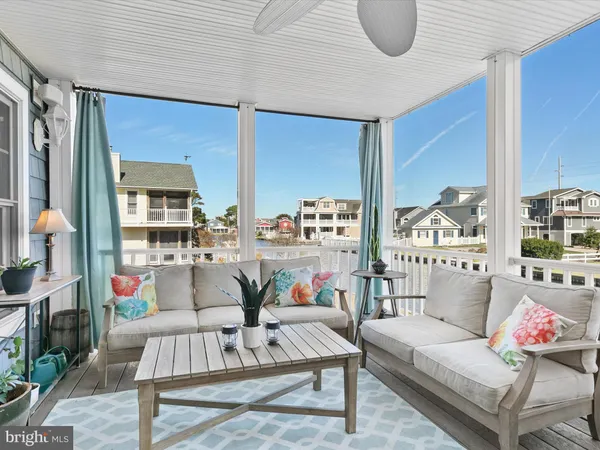 a bedroom with a bed and a table