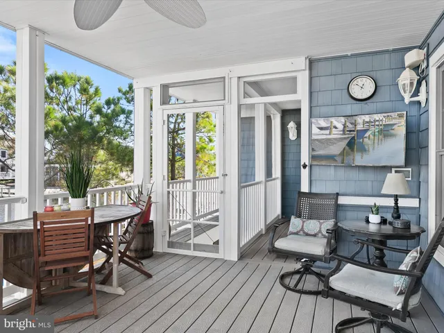 a bedroom with a bed dresser and a window