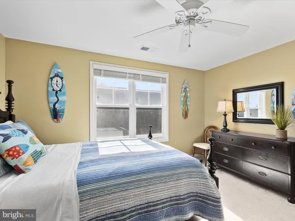 a bedroom with a bed and a table in it