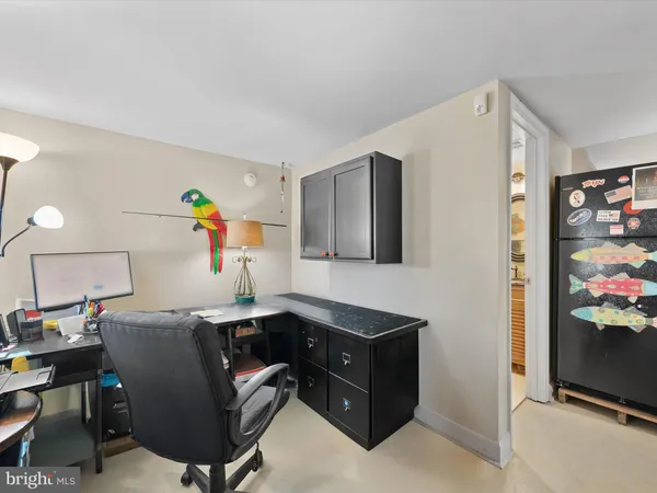 an aerial view of residential houses with city view