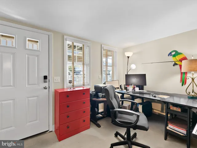 an aerial view of a house with a ocean view