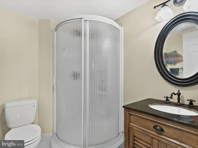 a view of a patio with chairs and tables