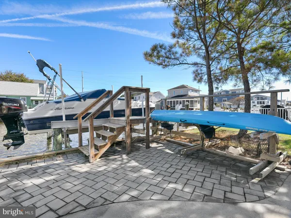 a front view of a house with parking