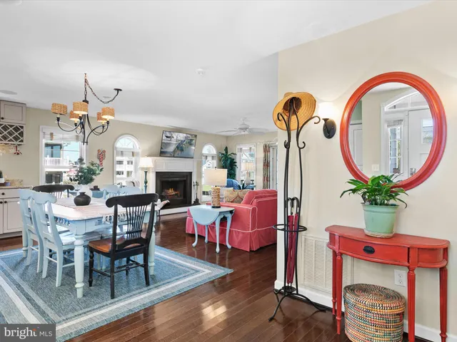 a living room with furniture fireplace and window