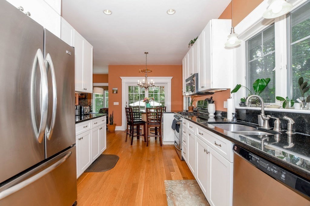 6 Jobs Cove Road Marion, MA 02738 - Photo 11 of 34 a kitchen with stainless steel appliances granite countertop a sink a stove and a refrigerator