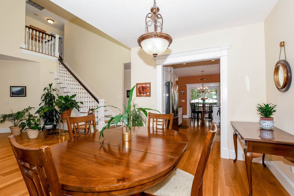 6 Jobs Cove Road Marion, MA 02738 - Photo 7 of 34 a view of a dining room with furniture window and wooden floor