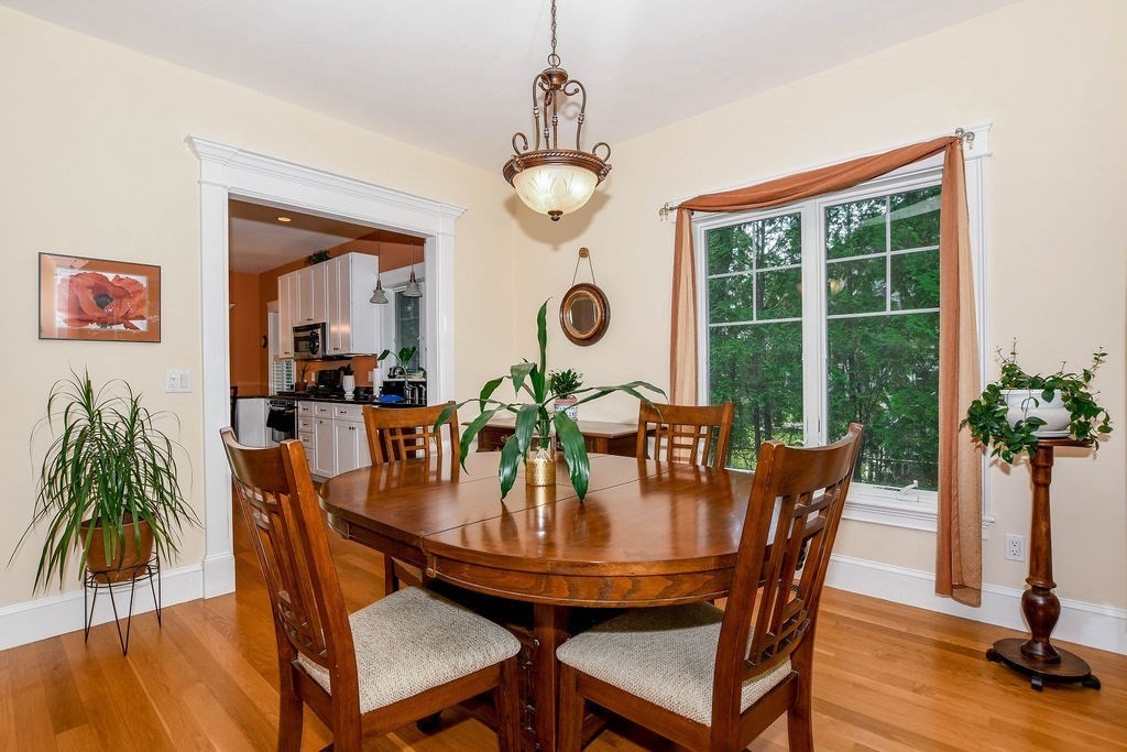 6 Jobs Cove Road Marion, MA 02738 - Photo 9 of 34 a view of a dining room with furniture window and wooden floor