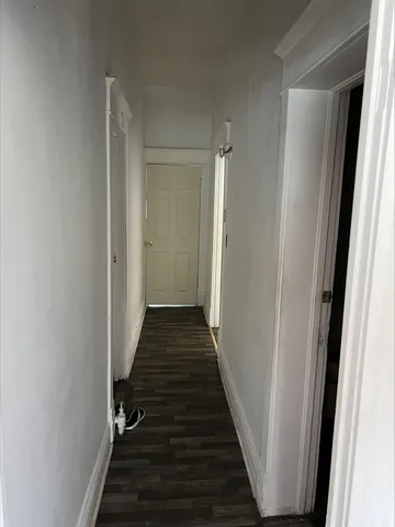 a front view of a house with a yard table and chairs