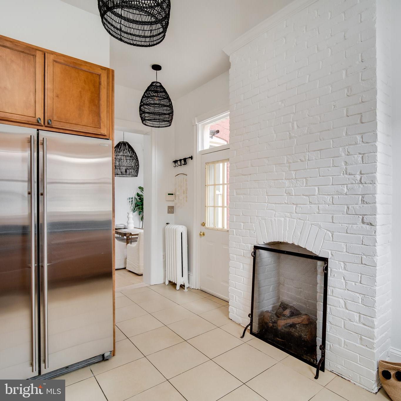 39 S Street Northwest Washington, DC 20001 - Photo 17 of 54 Gorgeous Brick Chimney w Gas Fireplace in Kitchen
