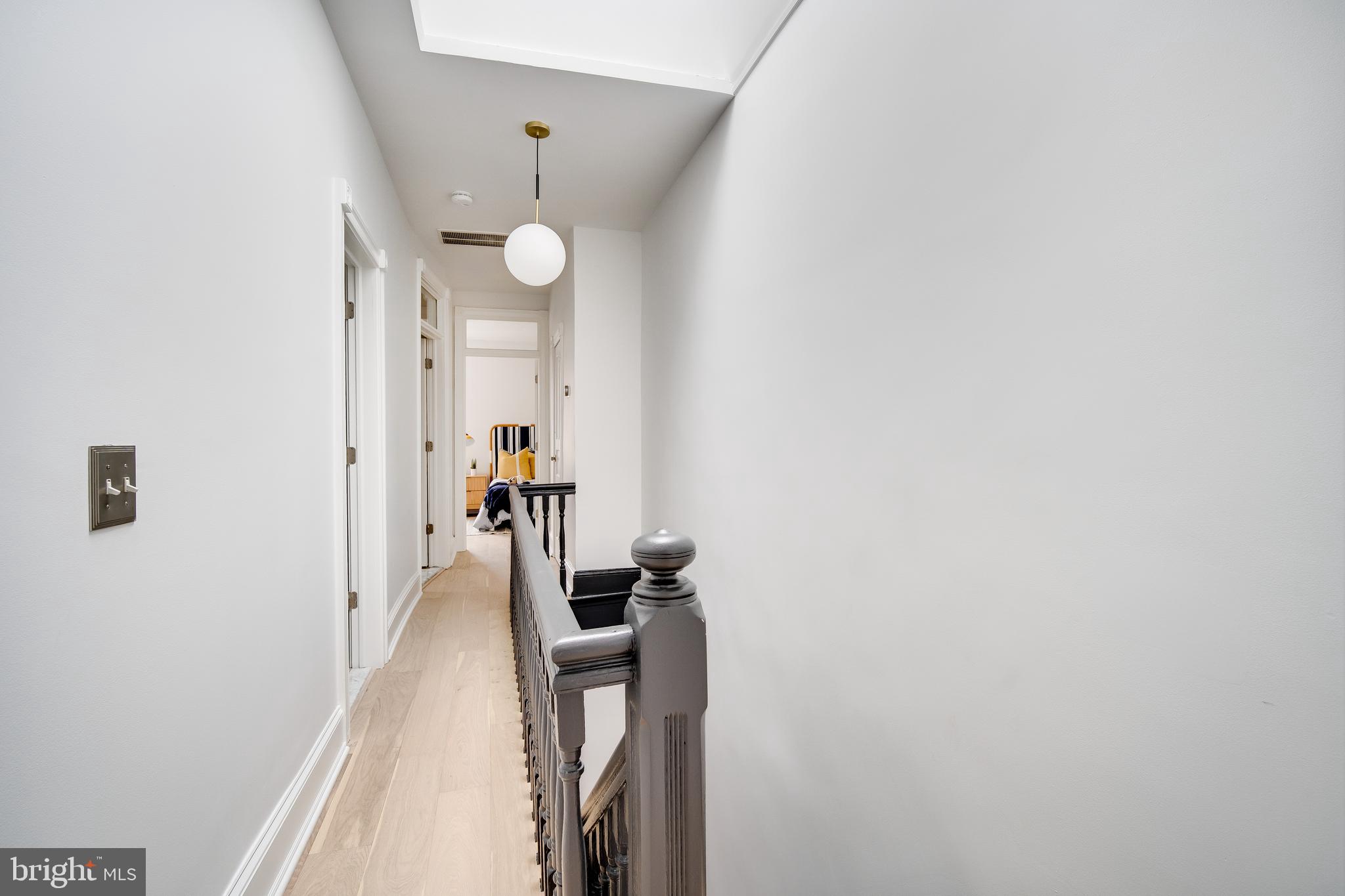 39 S Street Northwest Washington, DC 20001 - Photo 30 of 54 Upper Hallway w Skylight & Modern Globe Pendant