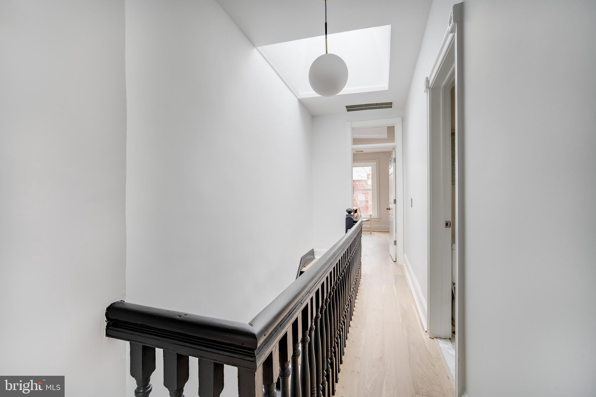 39 S Street Northwest Washington, DC 20001 - Photo 31 of 54 Upper Hallway w Skylight & Modern Globe Pendant