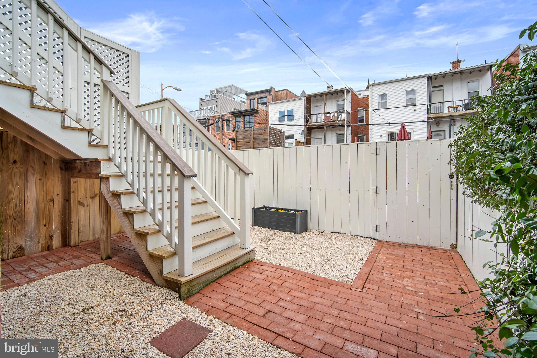 39 S Street Northwest Washington, DC 20001 - Photo 38 of 54 Fenced in Patio Leading Out to Off Street Parking