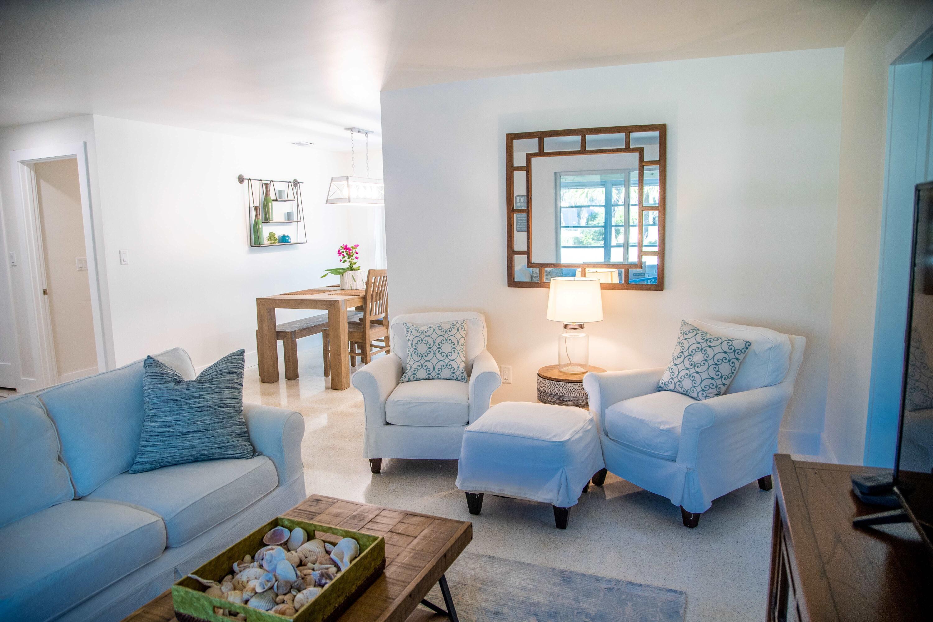22 Van Road Jupiter, FL 33469 - Photo 11 of 38 a living room with furniture and a window