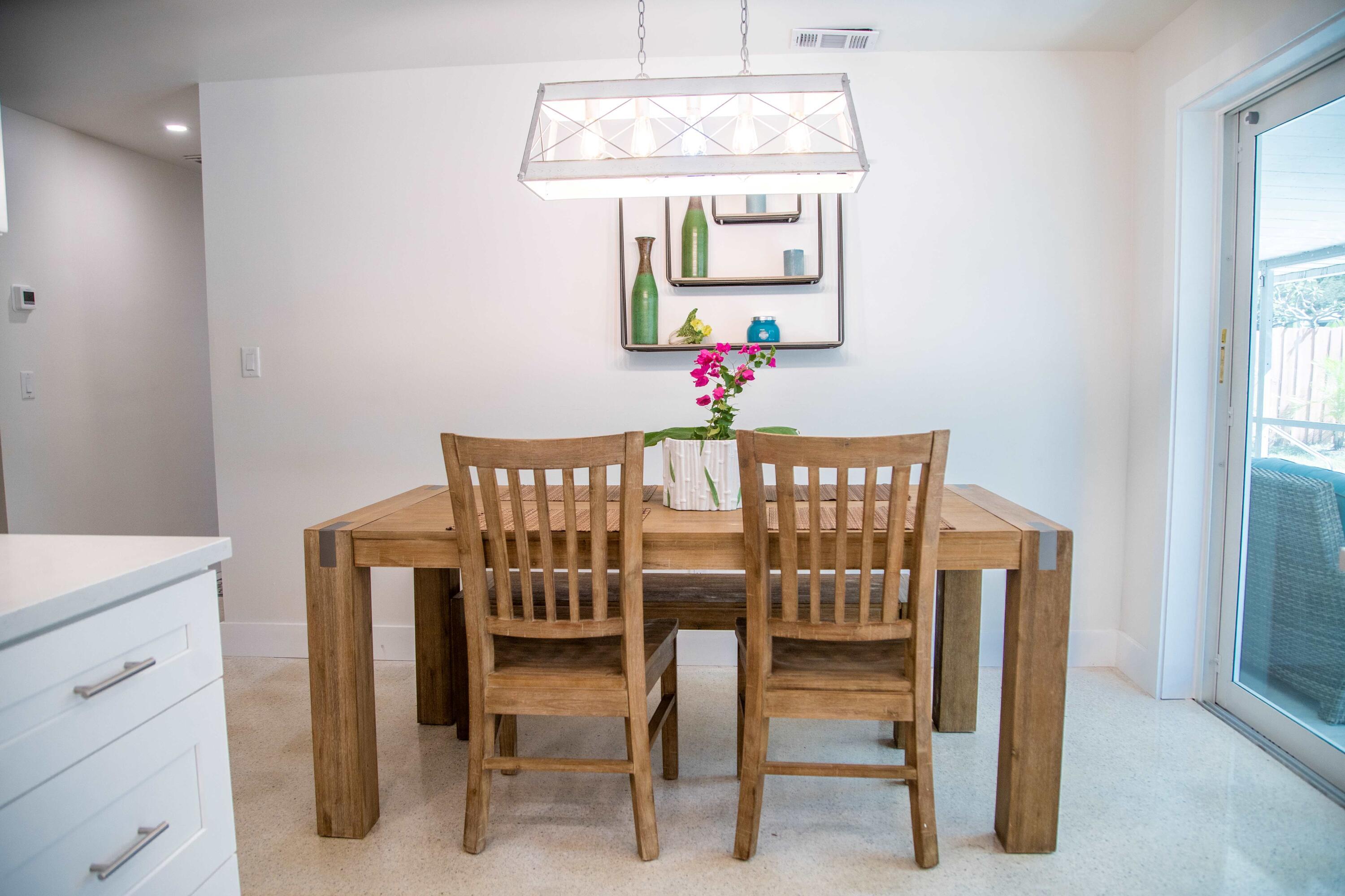 22 Van Road Jupiter, FL 33469 - Photo 22 of 38 a view of a dining room with furniture